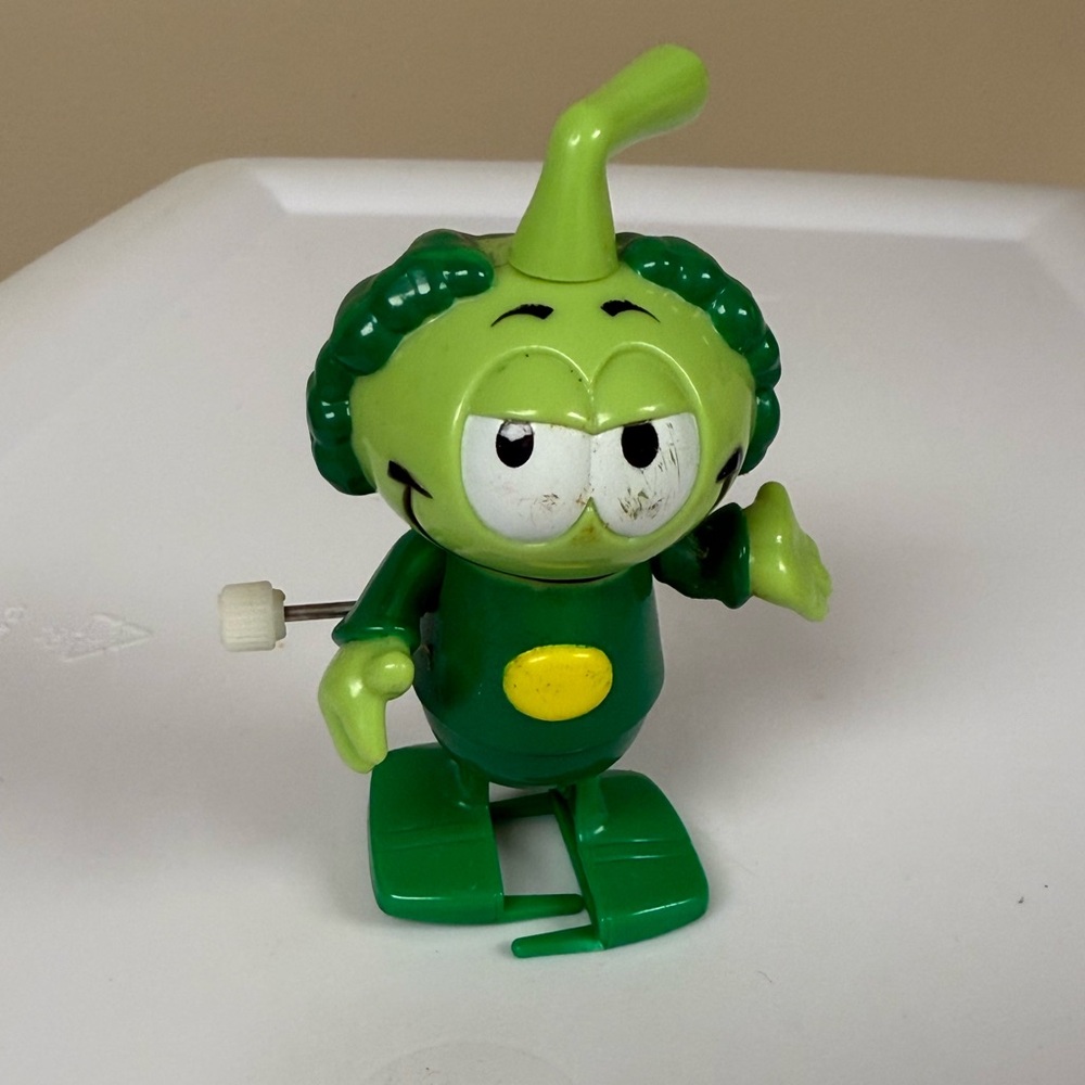 Vintage Tomy green Snorks walker toy wind-up